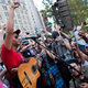 Rage Against The Machine's Tom Morello performing at Occupy Wall Street in 2012